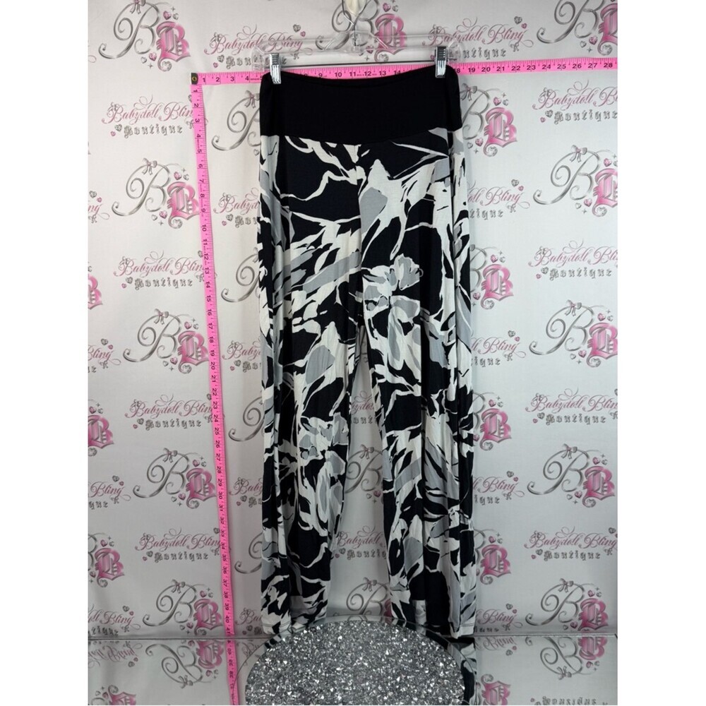 Dolcezza Wide Leg Palazzo Pants - Black background with a White Floral Print